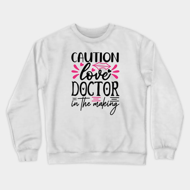 Caution Love Doctor in the Making Crewneck Sweatshirt by VijackStudio